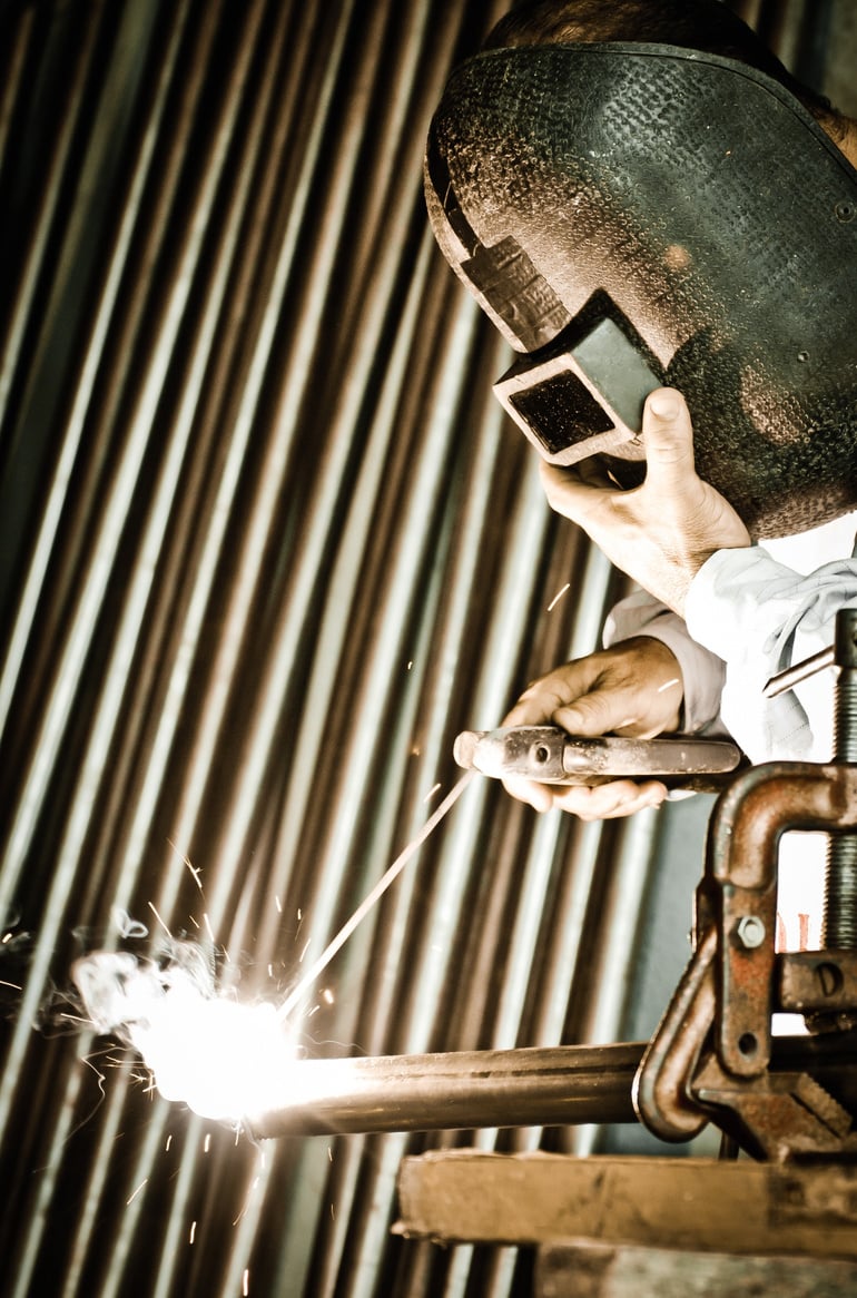 Welder Fabricating Metal